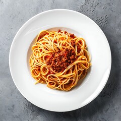 Spaghetti bolognese on white plate over stone background.