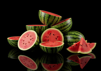 Watermelon Pieces Stack on Dark Reflective Surface
