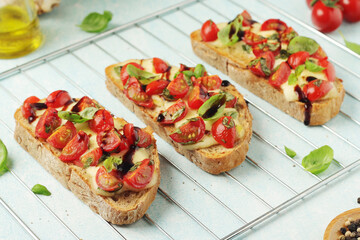 Freshly made bruschetta sandwiches - traditional dish of Italian cuisine