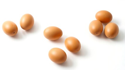 Brown eggs on a white background, showcasing simplicity and natural beauty.