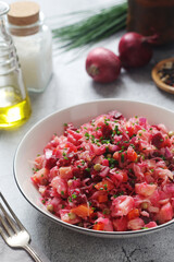 A bowl with Vinegret salad, a typical Russian dish