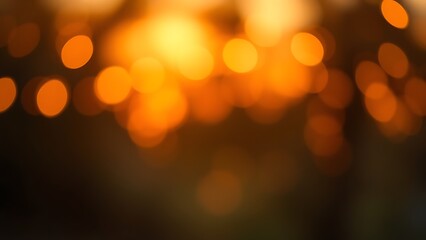Obraz premium Soft, glowing lights in warm sunset hues create a dreamy and romantic outdoor atmosphere.