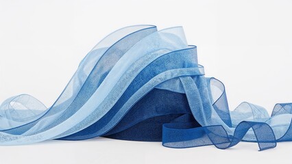 Blue gauze ribbon rolls stacked together on a plain white setting.