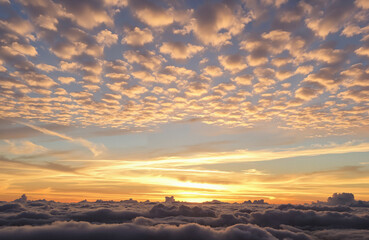 Colorful sunset sky with clouds above the horizon at dusk  
