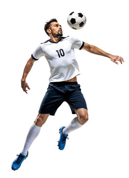 Fototapeta Male soccer player doing a powerful header onto a ball with his head