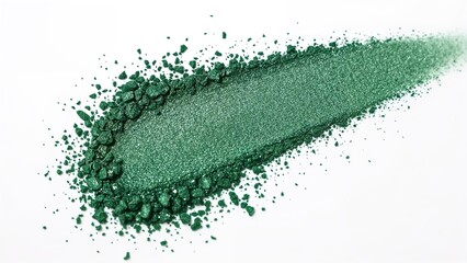 Close-up of green powdered eyeshadow on a white surface