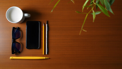 Creative Workspace with Coffee Smartphone and Stationery for Remote Work and Productivity Concepts