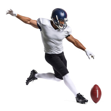 Focused American football athlete in white performing field goal kick