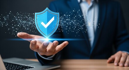 Businessman holding shield with checkmark, symbolizing cybersecurity, data protection, network safety, and privacy for information technology systems