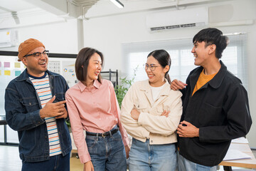 Asian business start up freelance people team analyzing statistics financial. Group Team of...