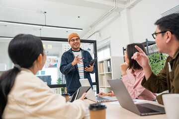 Asian business start up freelance people team analyzing statistics financial. Group Team of...