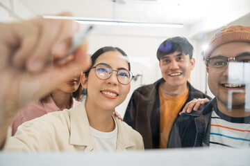 Asian business start up freelance people team analyzing statistics financial. Group Team of businesspeople man and woman Meeting Conference Discussion various topic Corporate Concept in office.