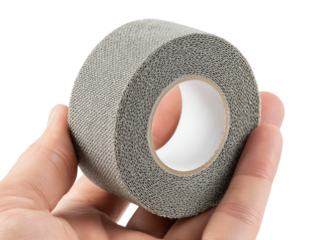 A close-up shot of a roll of medical bandage, held delicately in a hand