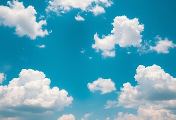 Vast expanse of azure sky dotted with fluffy white cumulus clouds,  nature,  beauty