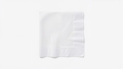 Single pristine paper napkin against a white backdrop
