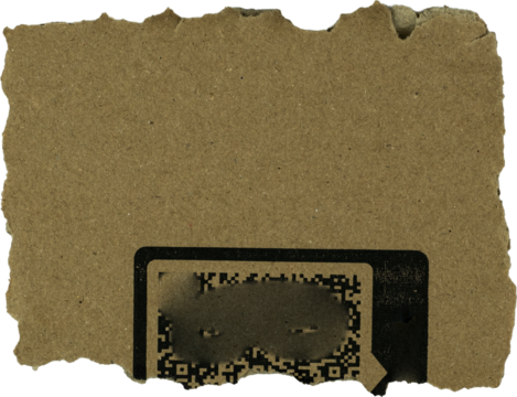 Torn cardboard piece with QR code design on dark background for packaging, crafts, and recycled material projects