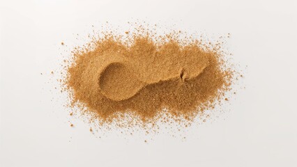 Overhead perspective of a sand pile on a neutral backdrop