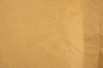 Dark Brown kraft paper texture background for packaging or crafting projects with a natural and rustic appearance