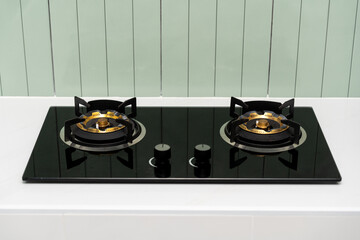 Modern Gas stove on counter. Built in kitchen furniture for cooking