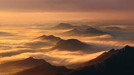 Obraz premium Serene Golden Clouds Above Majestic Mountain Peaks at Sunrise