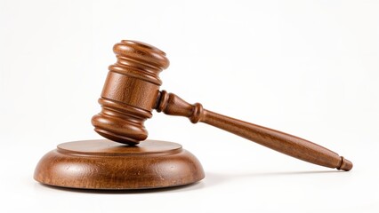 Isolated judicial hammer on white background symbolizing legal authority