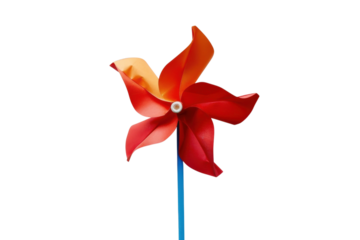 Brightly colored pinwheel spins joyfully in the sunlight, a playful decoration for outdoor festivities and children's activities
