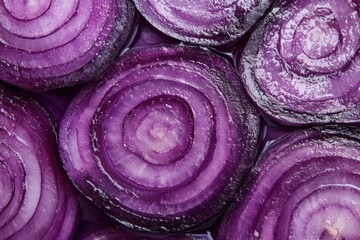 Fototapeta premium A close-up of fresh red onion slices arranged in a seamless pattern. The purple tones and detailed texture make it ideal for backgrounds, food packaging, food blogs or healthy eating campaigns. Banner