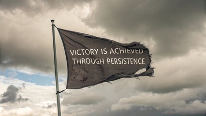 Worn Flag with Inspirational Quote on Victory and Persistence