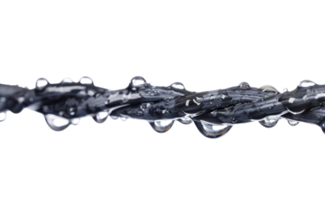 Close-up of a twisted rope covered in water droplets reflecting light in a minimalistic environment