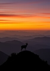 Deer on Mountain Peak at Dawn
