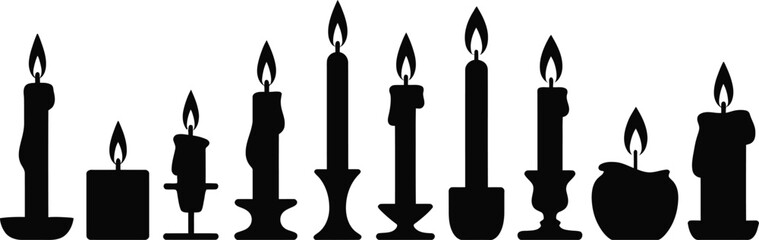 Collection of lit candles in silhouette against a white background