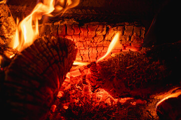 Abstract background of hot burning charcoal and fire flames. Concept of heat, energy, and the power...
