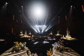 Elegant event setup with spectacular lighting at evening venue