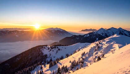 Sunrise over snowcapped mountains.