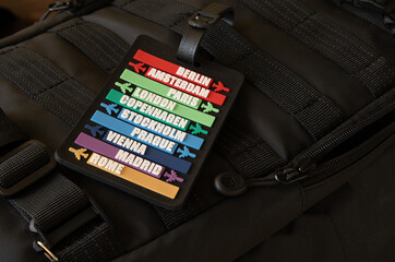 Information sign attached to airplane hand luggage, sign with the names of European capitals,