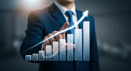 Businessman touching glowing upward trending graph with arrow suit blue