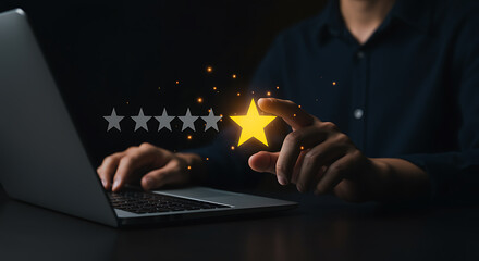Person selecting a glowing yellow star rating on a laptop stars