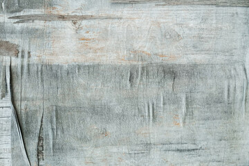 Weathered gray laminated plywood. Texture, background.