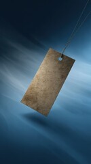 Vintage paper tag floating in blue space with abstract texture, minimalist design concept.
