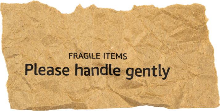 Brown packaging paper with fragile items warning saying please handle gently for shipping or packaging use, torn edges brown paper PNG