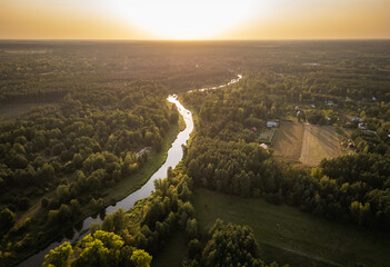 Aerial view of Liwiec river in Barchow village, Mazowieckie region of Poland