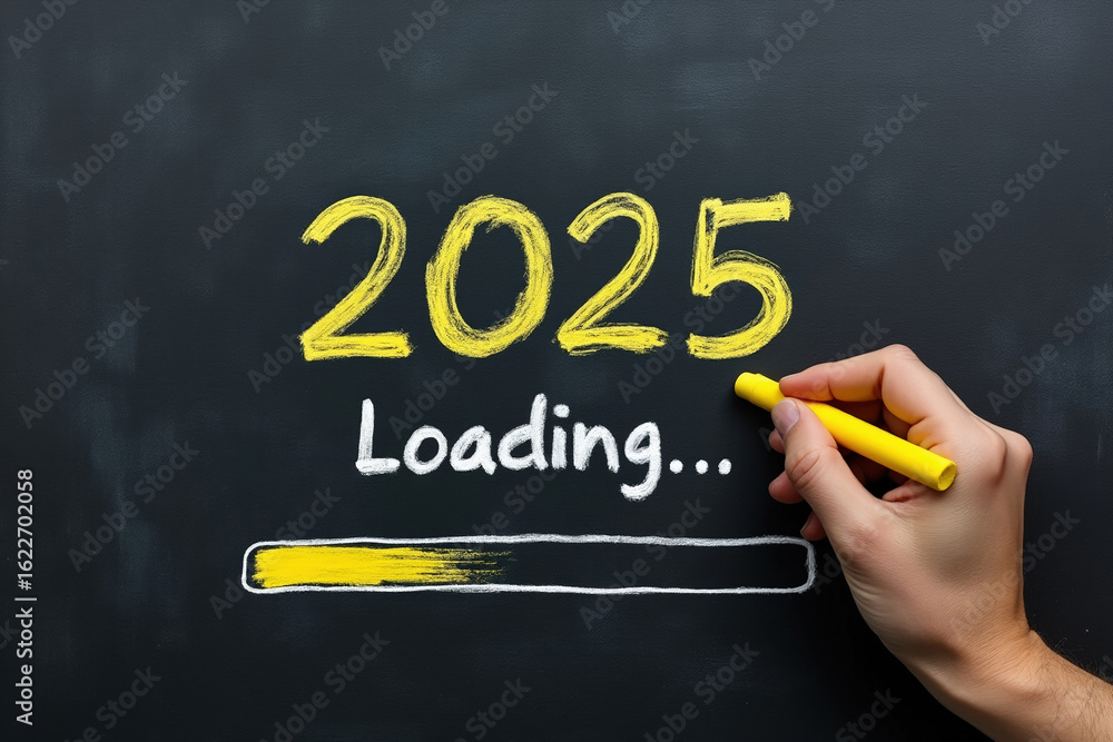Poster chalkboard displaying loading bar and 2025 with hand holding yellow chalk for future projects