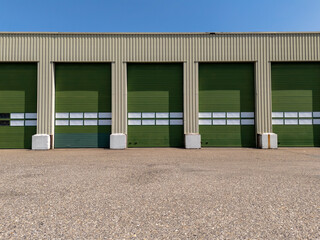 Green Garage Doors of an industrial building