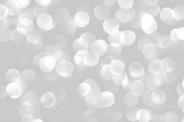 White bokeh light background with soft focus glowing circles
