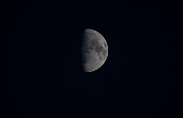 A half-full moon in the sky