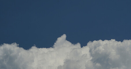 Big white clouds are spreading.