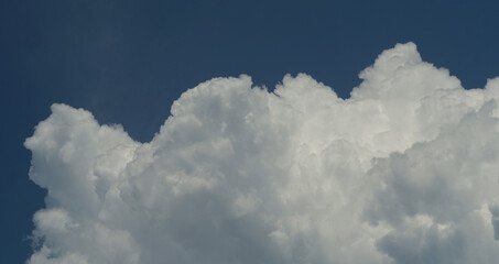 Big white clouds are spreading.