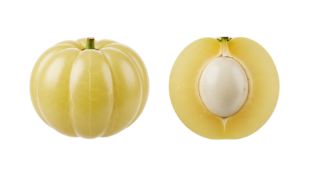 Closeup of Amla fruit one whole and one sliced revealing the seed.