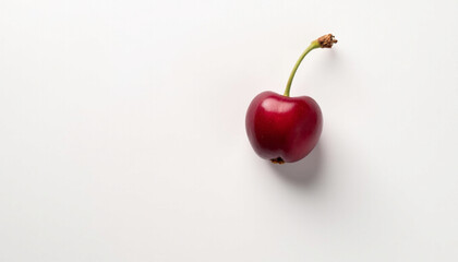 Minimalist arrangement of fresh red cherries on pastel and white backgrounds, creating a clean and modern visual suitable for food styling, healthy lifestyle themes, and editorial use.