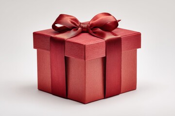 Obraz premium Gift box with red ribbon conveys warmth and celebration for special occasions